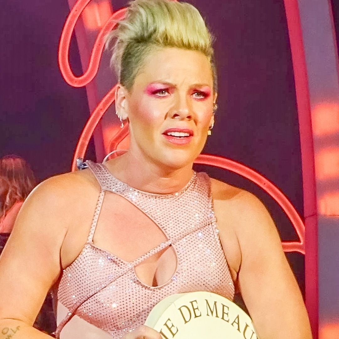 See Pink Receive a Wheel of Cheese From Fan Before Being Given Ashes